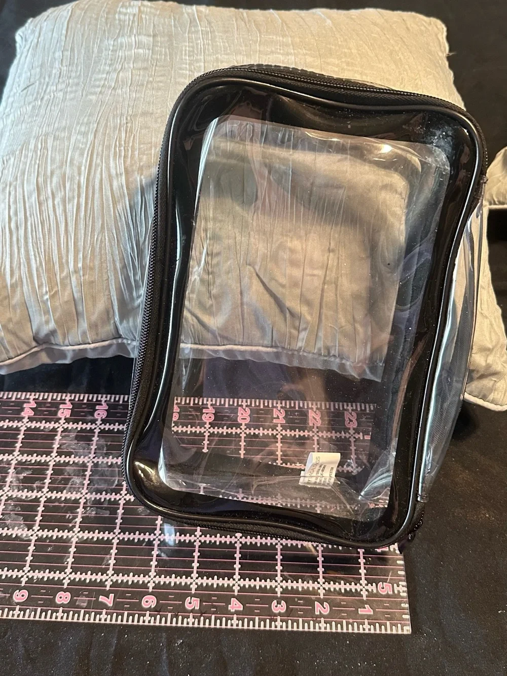 Clear PVC cosmetic/toiletry bag with black trim